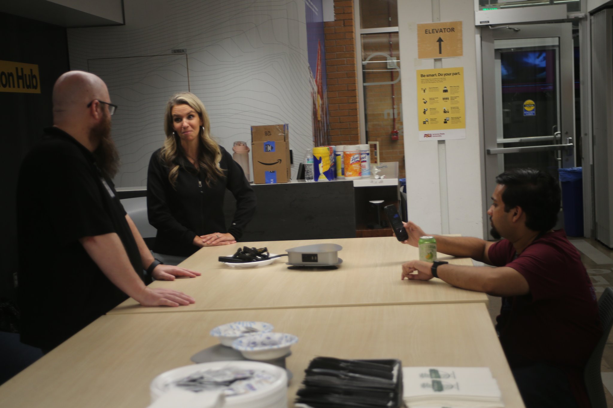 Daniel Dickinson takes a break from photography to chat with Lacey and Panda