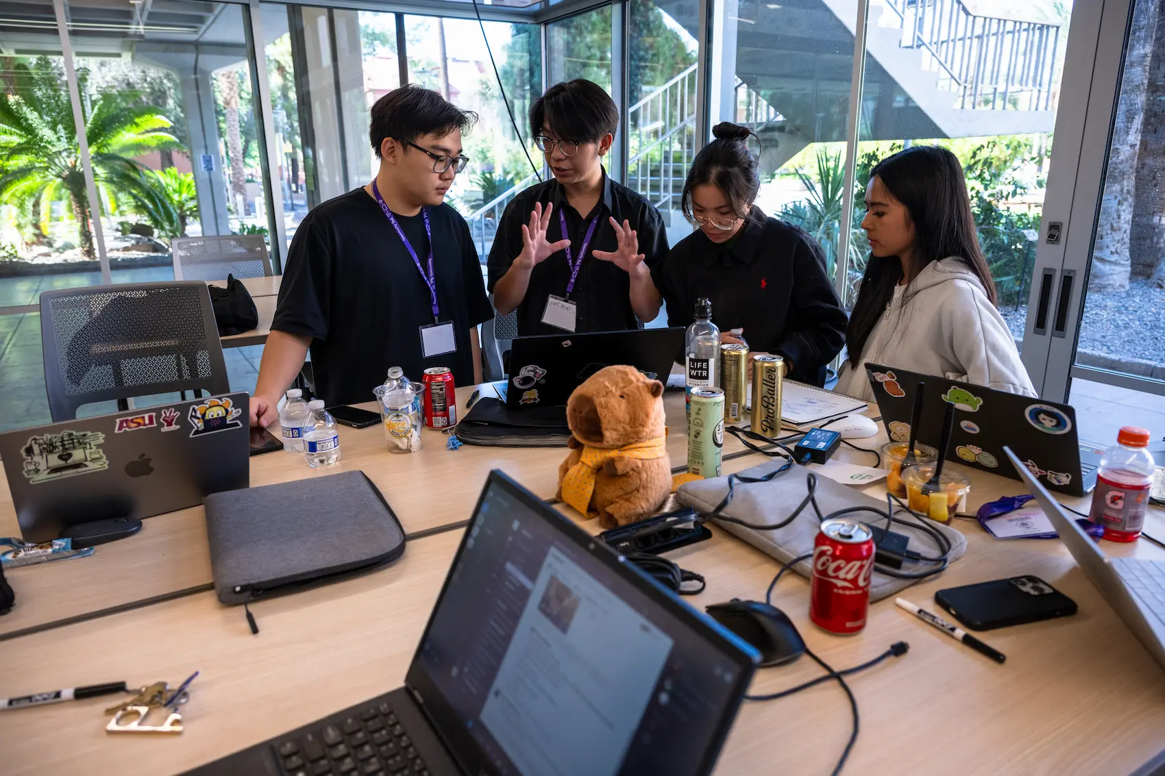 Hackathon participants working together in ECG 101 Generator lab